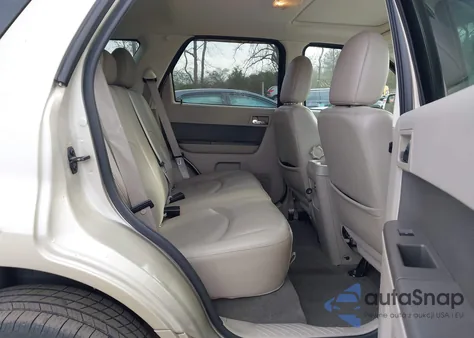 2010 Mercury Mariner Premier z USA, uszkodzony, nr VIN 4M2CN8HG2AKJ07405